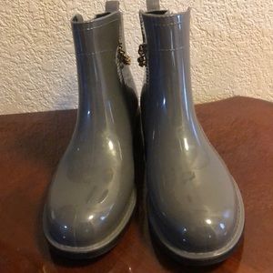 Dark grey rain boots size 11M.